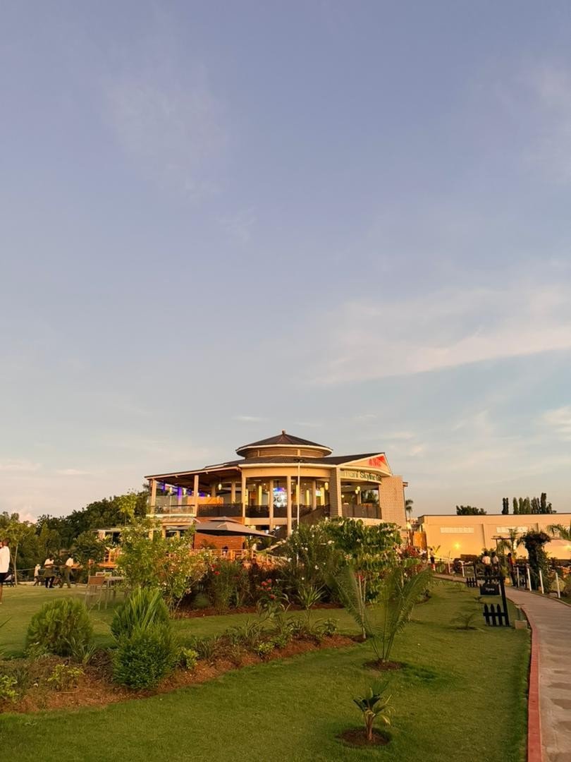 Circular garden building and lawn